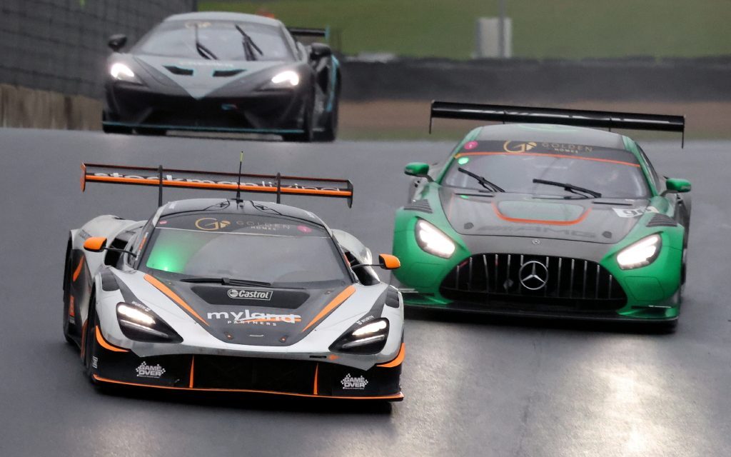 McLaren 720S GT3 and Mercedes-Benz AMG GT3 racing at Hampton Downs in wet conditions