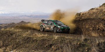 Hayden Paddon Hyundai i20 AP4 car drifting on rally stage