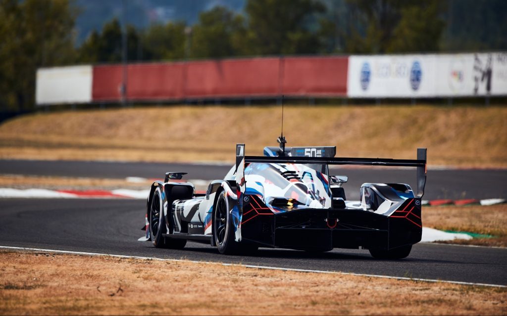 BMW M Hybrid V8 LMDh on Dallara test track rear three quarters