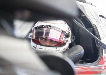 Earl Bamber testing Cadillac Racing LMDh car with helmet on