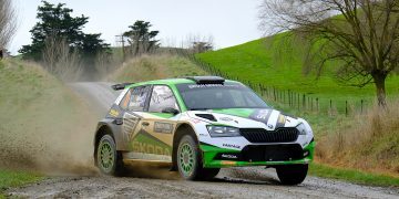 Ben Hunt's Skoda Fabia R5 sliding around gravel corner front three corners