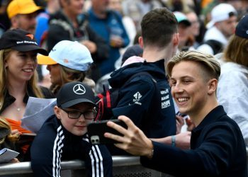 Liam Lawson taking picture with fan at British GP