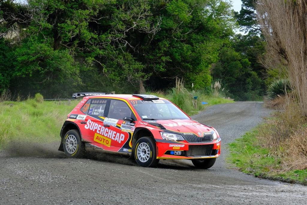Shane van Gisbergen's Skoda Fabia R5 sliding around gravel corner