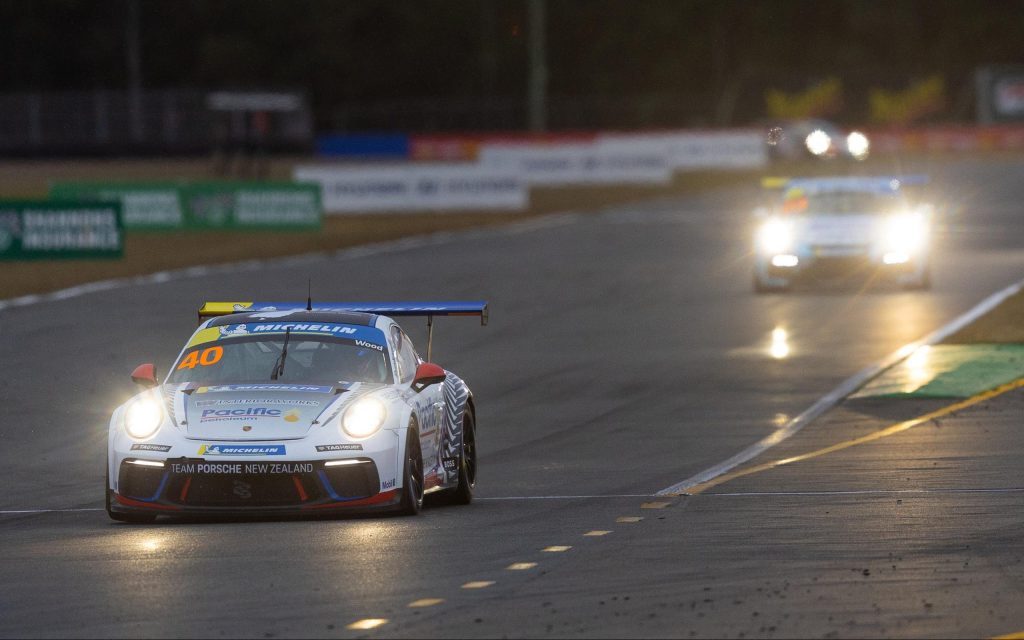 Porsche Cup cars racing at Queensland Raceway