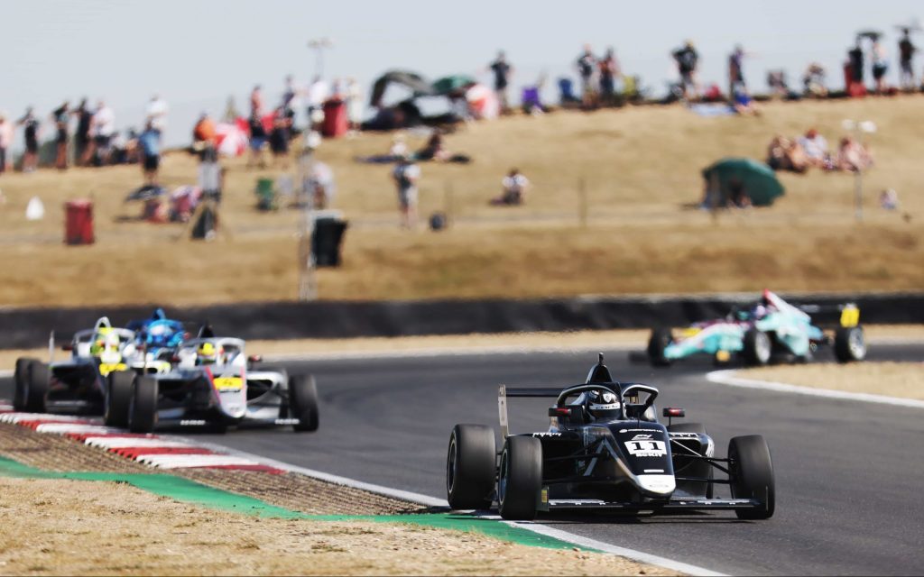 Louis Sharp Carlin Formula 4 car racing at Snetterton front view