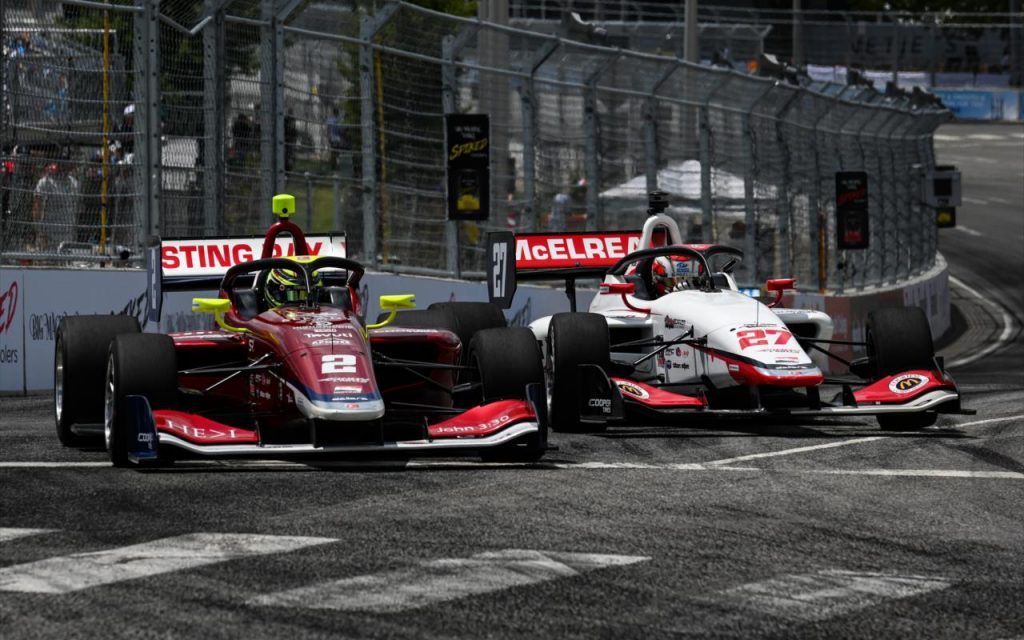Hunter McElrea and Sting Ray Robb racing side by side at Indy Lights Nashville race