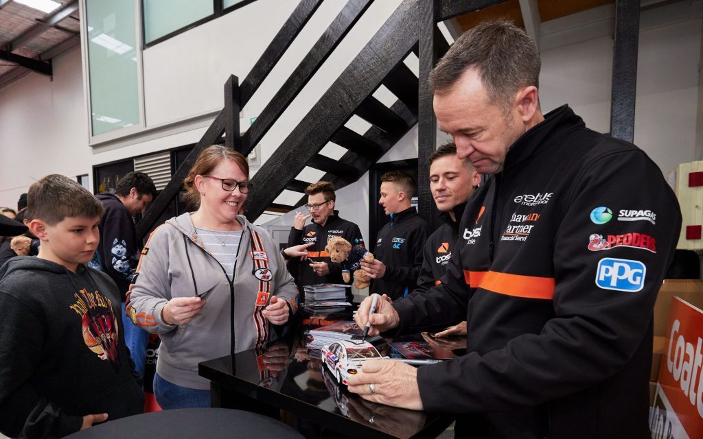 Greg Murphy signing Supercar model with fans