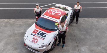Rhys Tinney, Mitchell Sparrow and Tony Walker standing with Toyota 86 racing car