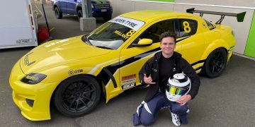 Flynn Mullany standing next to Mazda RX8 side view