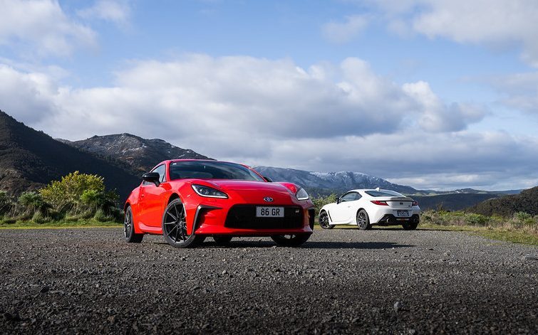 Two Toyota GR86s front and rear views