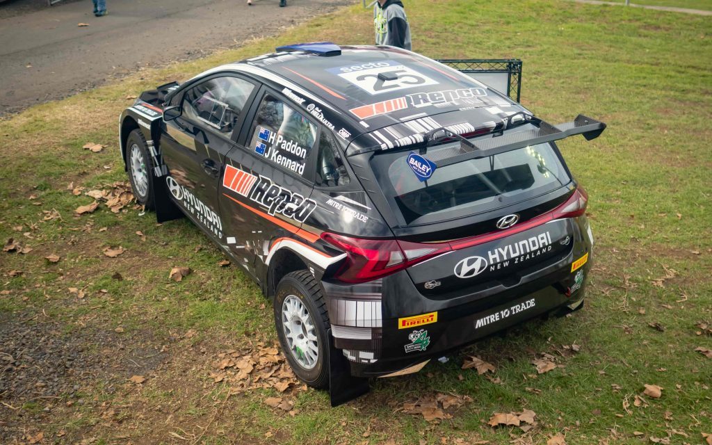 Hayden Paddon's Hyundai i20 Rally2 car with Repco livery top down rear three quarter view