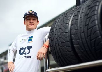Nick Cassidy leaning on tyres