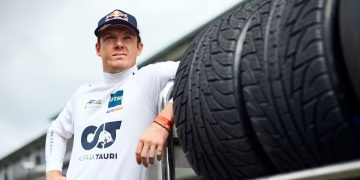 Nick Cassidy leaning on tyres