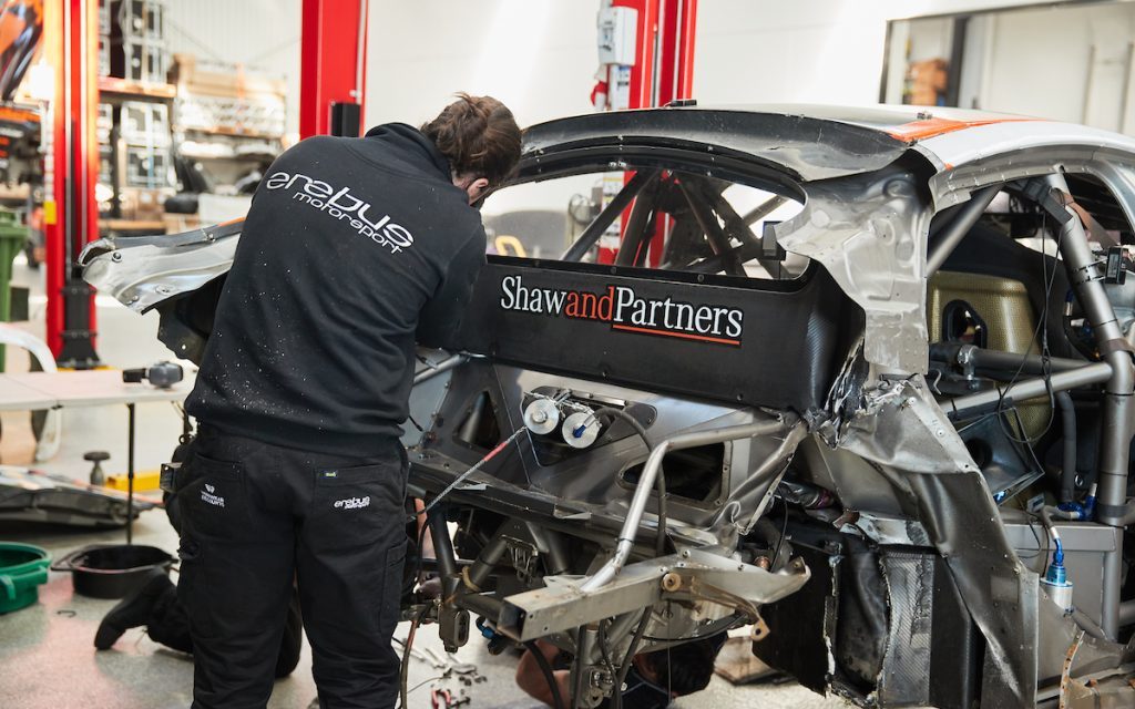 Will Brown's Erebus Motorsport Holden Commodore being repaired by mechanic