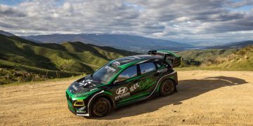 Hayden Paddon's Hyundai Kona EV drifting on dirt road