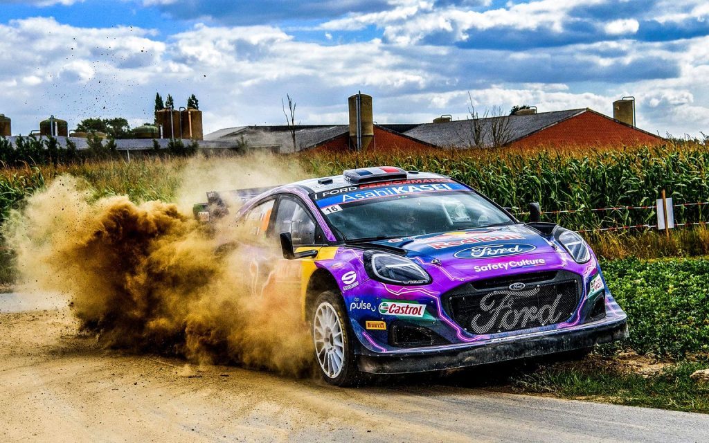 Ford Puma M-Sport WRC rally car driving on dirt road in Belgium