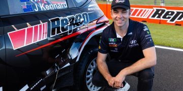 Hayden Paddon with rally car
