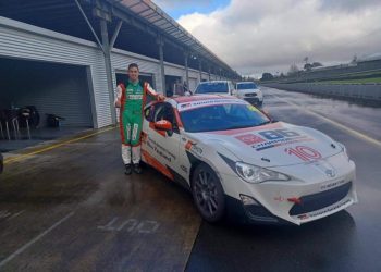 Thomas Randle standing next to Toyota 86 race car at Pukekohe