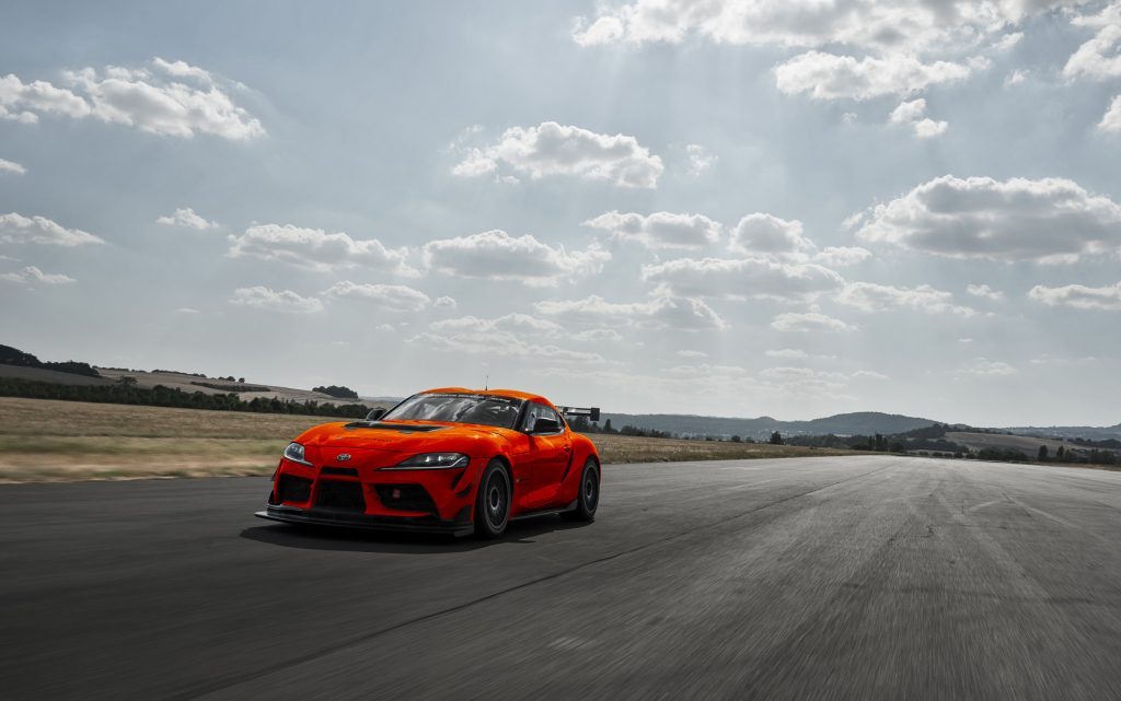 Toyota GR Supra GT4 EVO front three quarter view driving