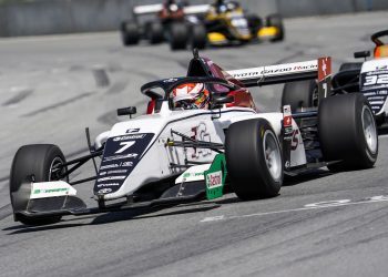 Toyota Race Series car front three quarter view on track