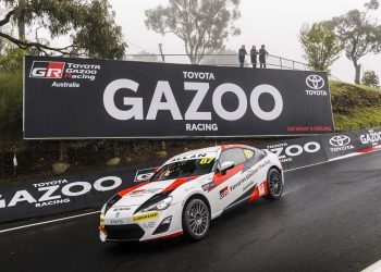 Hugo Allen racing down hill at Bathurst in wet conditions