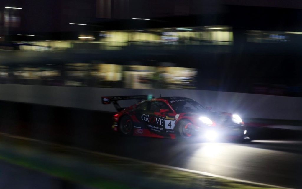 Porsche 911 GT3 racing at Mount Panorama Bathurst at night