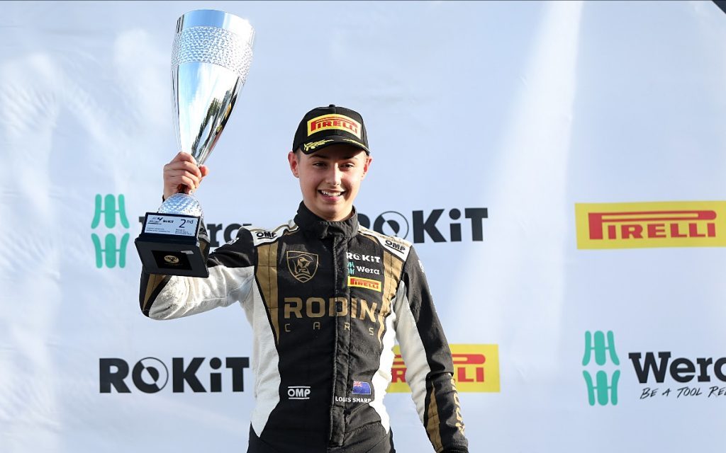 Louis Sharp holding trophy at Brands Hatch