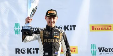 Louis Sharp holding trophy at Brands Hatch