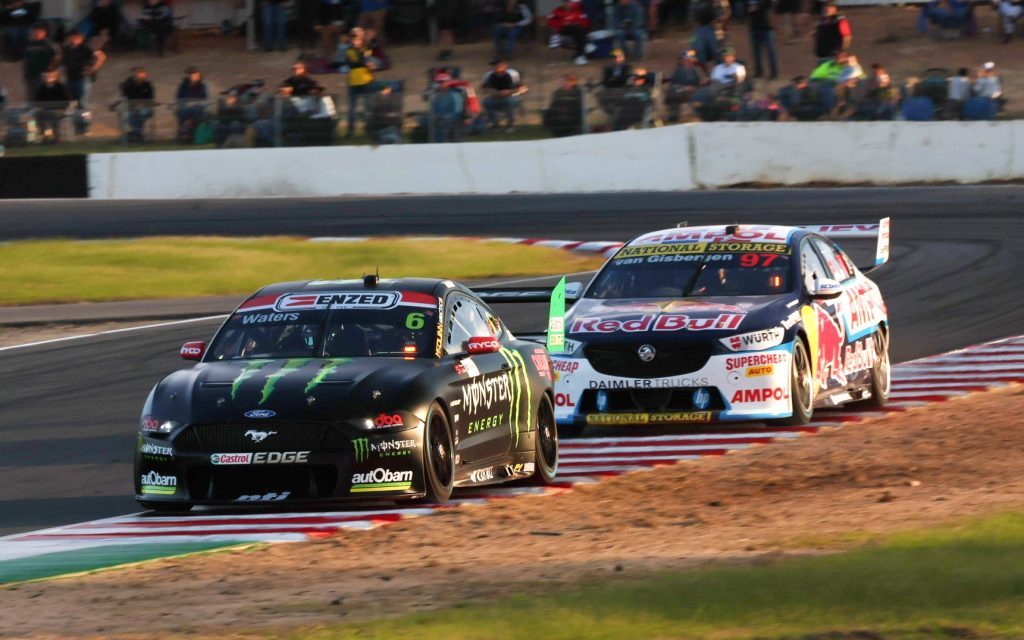 Cam Waters' Ford Mustang Supercar leading Shane van Gisbergen's Holden ZB Commodore Supercar