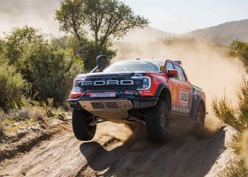 Ford Ranger Raptor Baja race truck jumping on sand dune