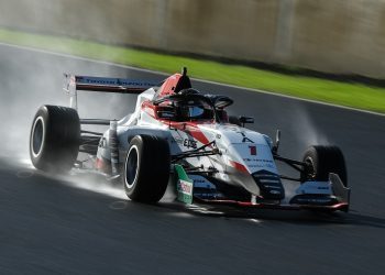 Toyota FT race car on track in wet