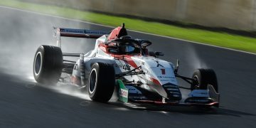 Toyota FT race car on track in wet