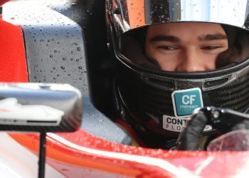 Callum Hedge sitting in open wheel race car