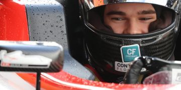 Callum Hedge sitting in open wheel race car