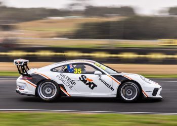 Porsche 991 Cup Car side view racing on track