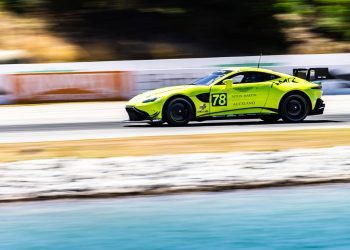 Aston Martin Vantage GT4 racing on track side view