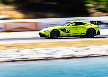 Aston Martin Vantage GT4 racing on track side view