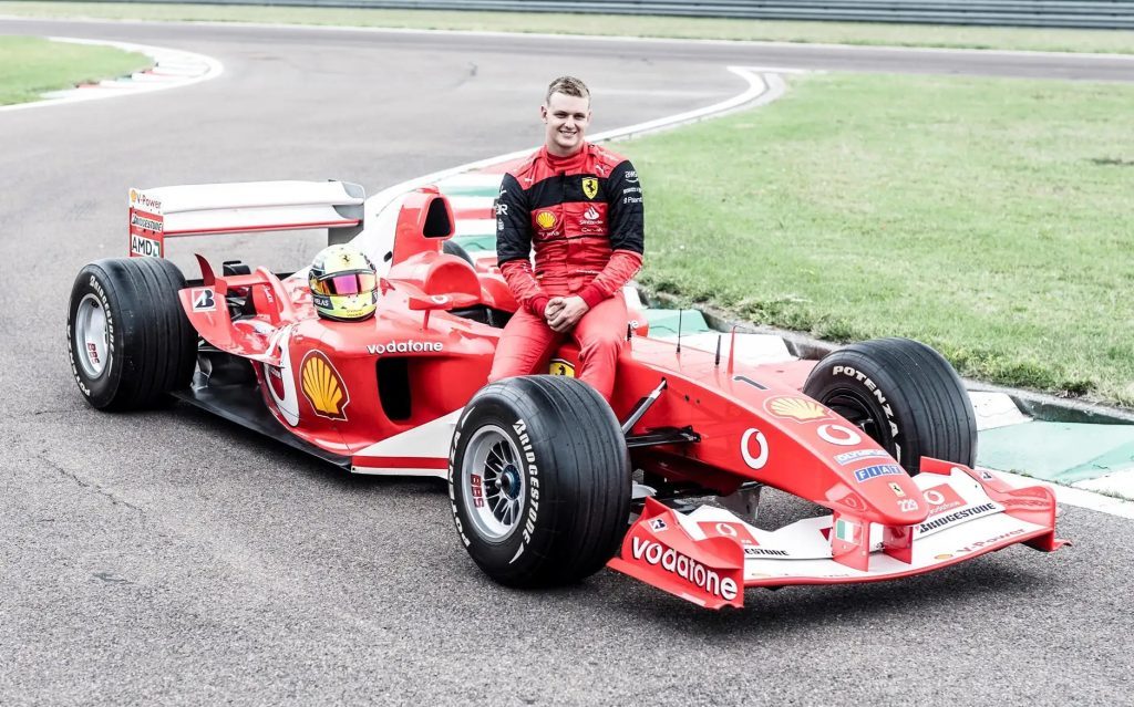 Mick Schumacher sitting on Ferrari F2003 GA