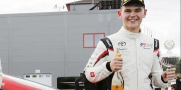 Harry McDonald standing next to Toyota GR Supra GT4