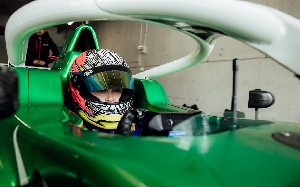 Bree Morris sitting in Toyota Racing Series car