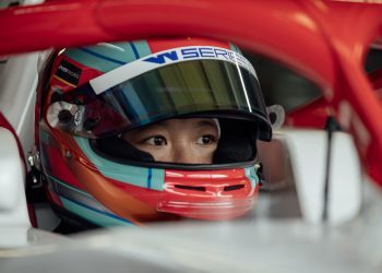 Chloe Chambers in formula car with helmet on