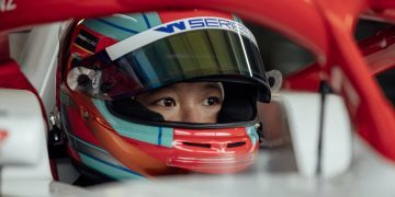 Chloe Chambers in formula car with helmet on