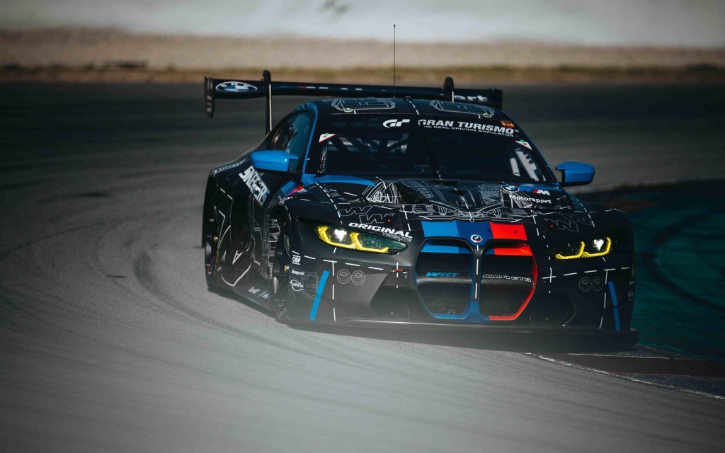 BMW M4 GT3 car racing on track front view