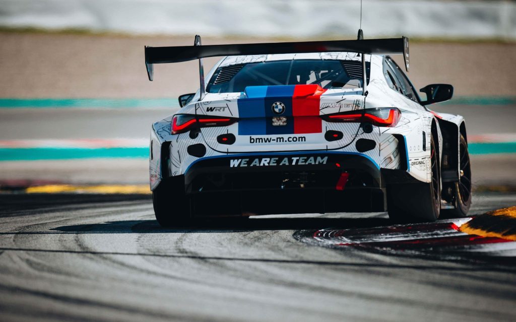 BMW M4 GT3 car racing on track rear view