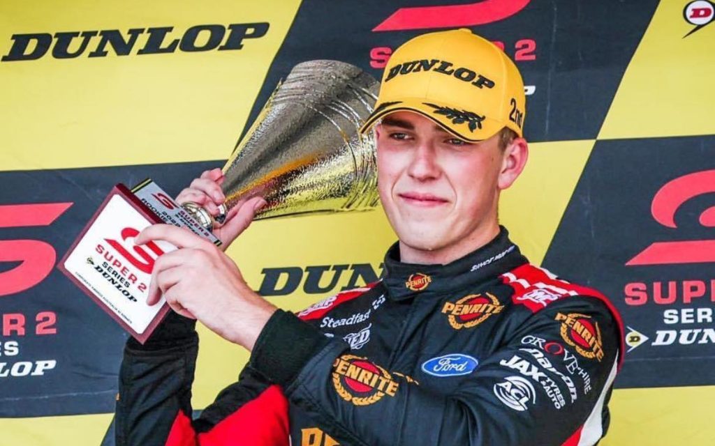 Matt Payne holding up Super2 trophy at 2022 VALO Adelaide 500