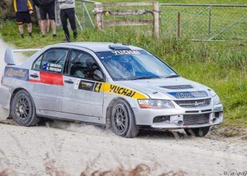 Mitsubishi Evolution rally car on gravel road