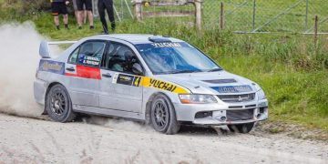 Mitsubishi Evolution rally car on gravel road