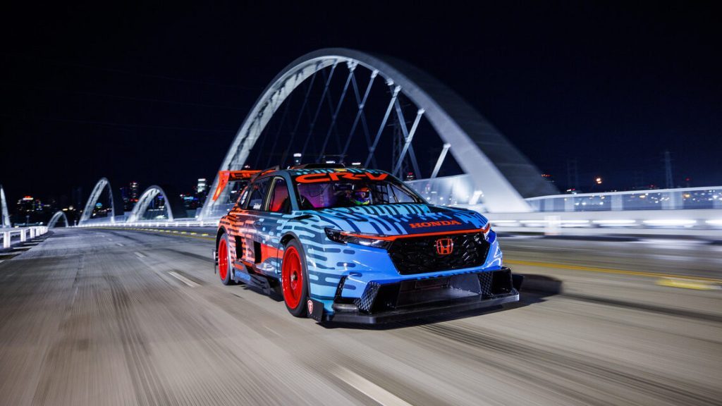 Honda CR-V Hybrid Racer driving on city street