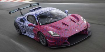 Maserati MC20 GT2 front three quarter view on track