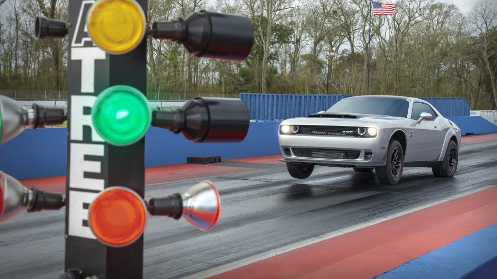 Dodge Challenger SRT Demon 170 doing wheel stand on drag strip